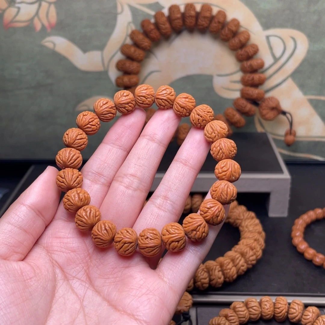 背***冲吊坠桃核12小金豆手串