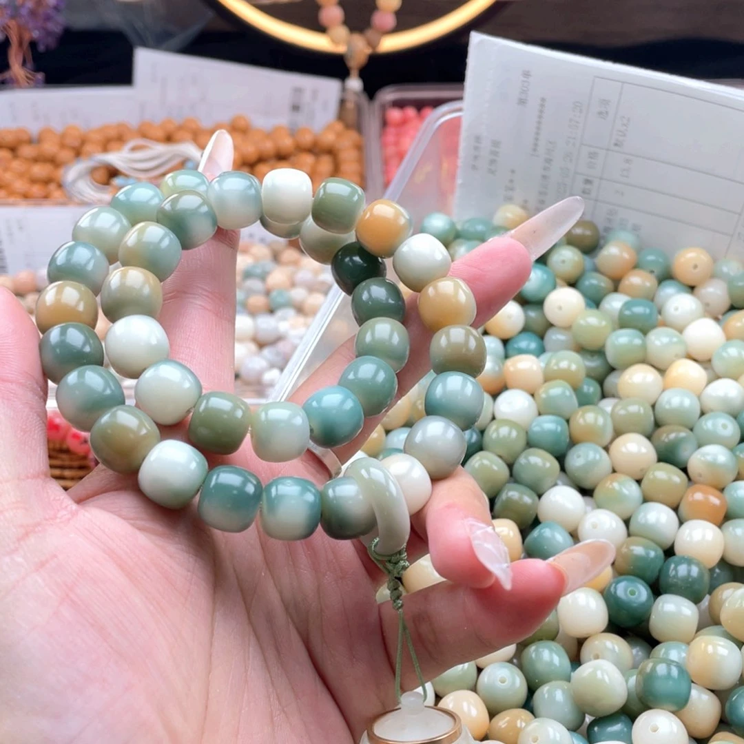 白玉菩提吊坠c11.75mm33颗。小青桔