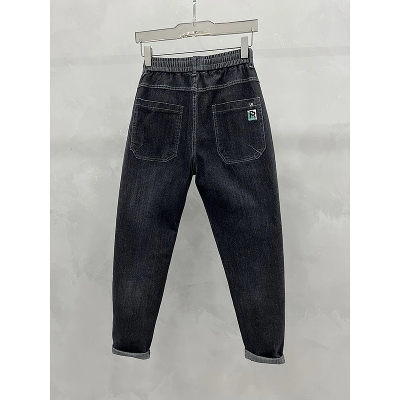 秋季新款松紧腰牛仔裤男士高秋季男款小脚九分牛仔裤