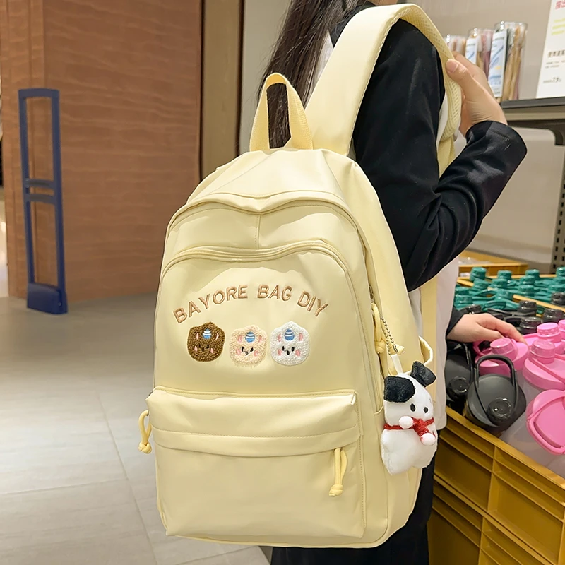 轻便高颜值书包初中女生小学生2025新款可爱背包高中大学生双肩包