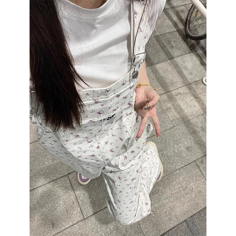 韩版复古碎花牛仔背带裤女春季2025设计感宽松阔腿拖地显瘦长裤子