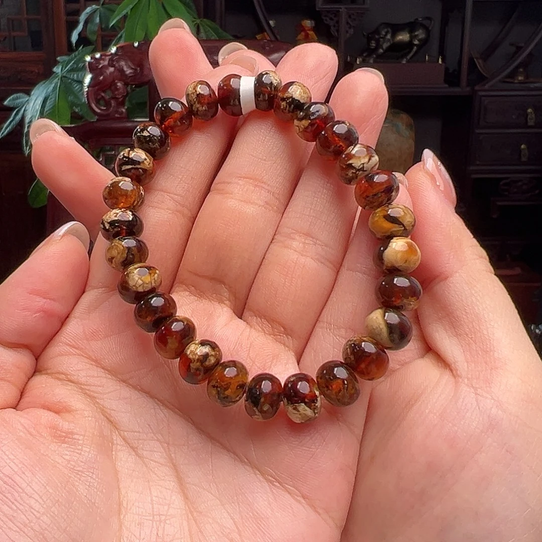 琥珀裸石未镶嵌抚顺琥珀70056-1。9m m