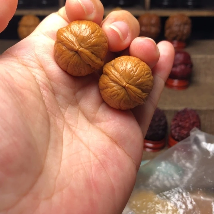 把件橄榄核77小蛇皮球25