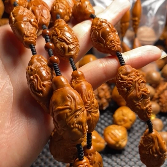 橄榄核吊坠江**子骑兽罗汉