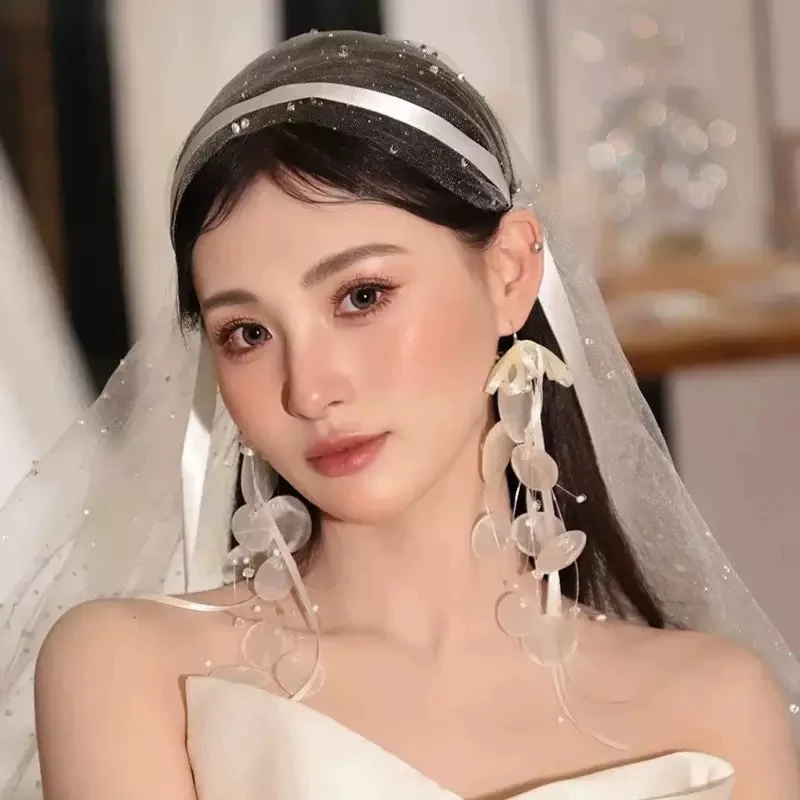 2025新品时尚母贝圆片新娘头饰吊坠甜美蝴蝶结丝配饰品