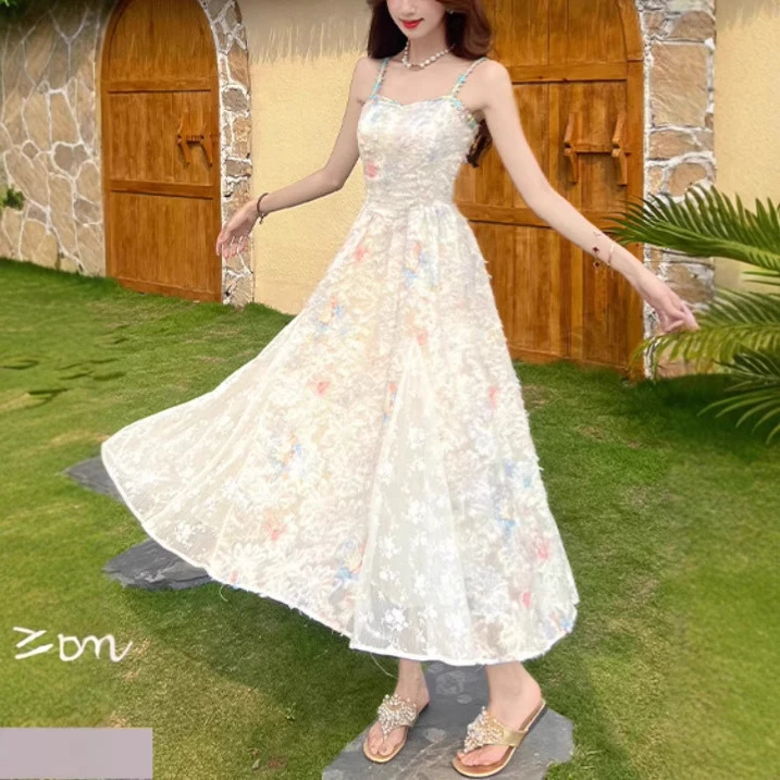 莫奈花园法式2025新款气质碎花夏季吊带连衣裙度假风收腰长裙