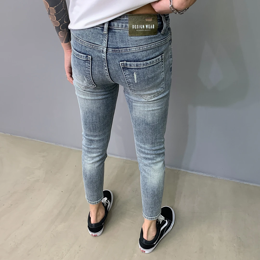 新款九分牛仔裤男秋冬季潮流蓝色百搭时尚破洞小脚裤修身韩版弹力