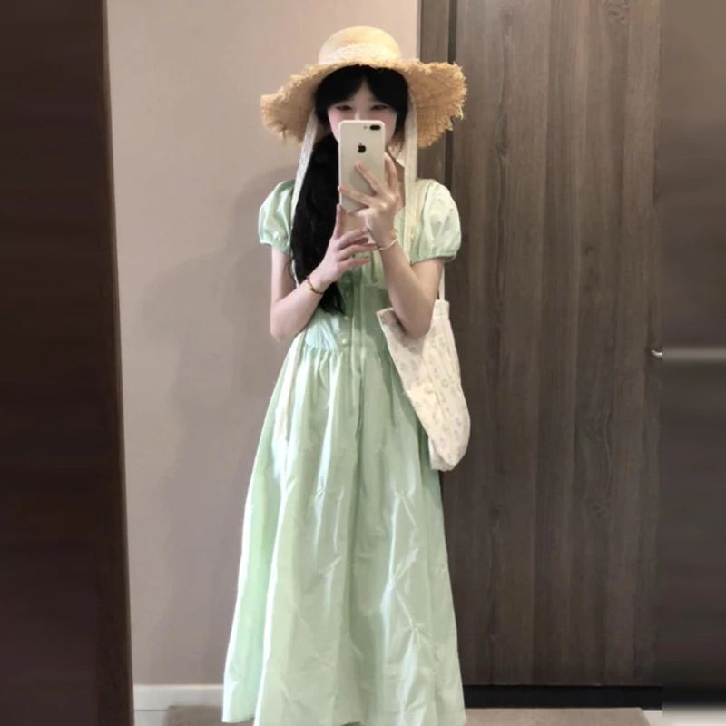 2025新款法式绿色短袖连衣裙子女夏季绝美海边超好看收腰显瘦长裙