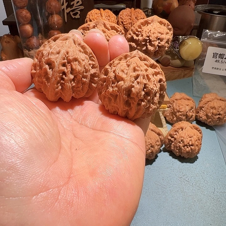 文玩核桃把件三角白反油42