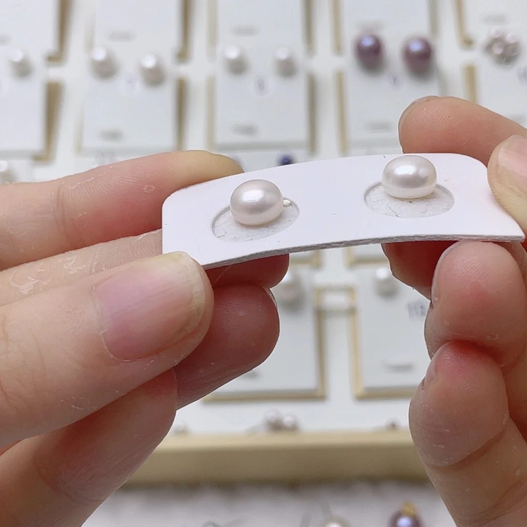 旺****银S925镶嵌淡水珍珠耳饰