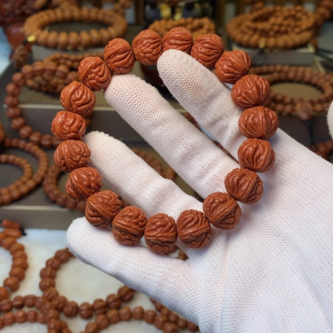 贺***学手串桃核秦岭龙纹