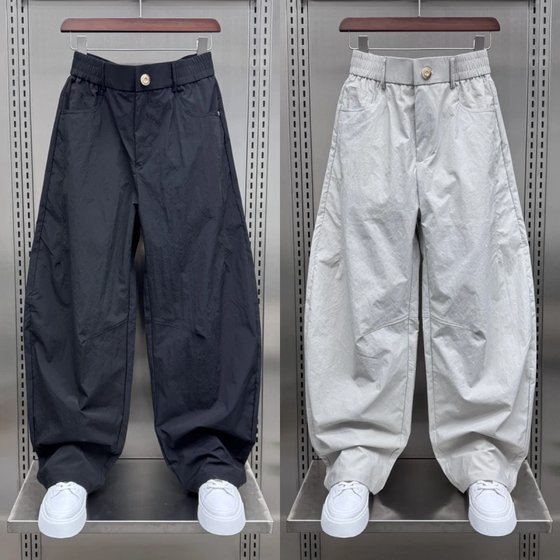 日系潮牌拼接设计休闲裤男士2025秋季时尚痞帅宽松工装阔腿弯刀裤