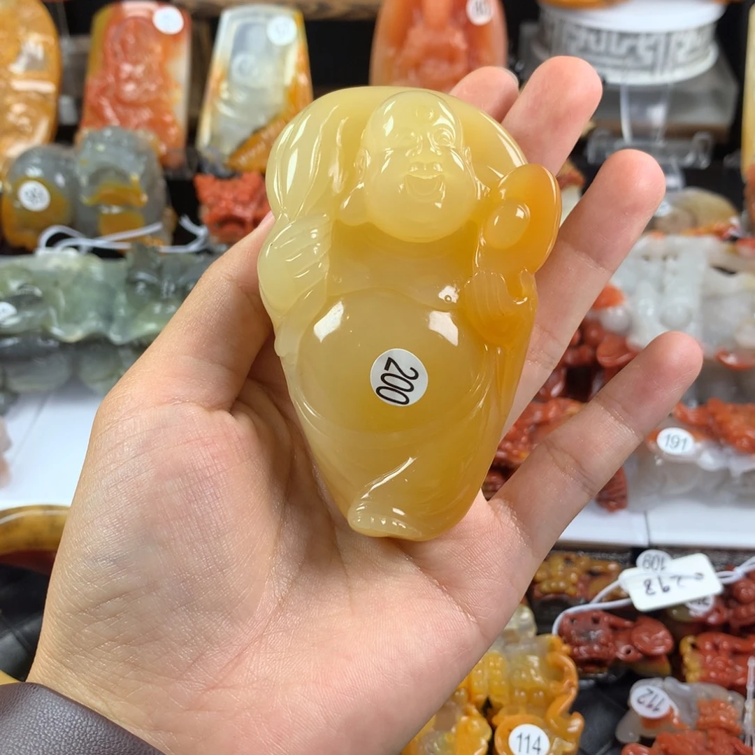 盘***易石英质玉（黄龙玉）未镶嵌手把件