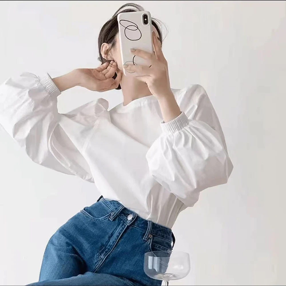 法式宽松白色泡泡袖衬衫女秋复古洋气别致甜美设计感小众圆领上衣