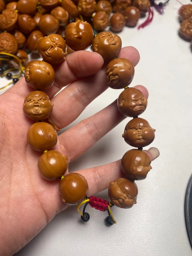 橄榄核雕刻手串处理