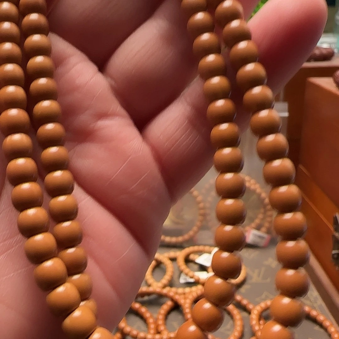 还***9手串橄榄核老挝脖挂6.2mm