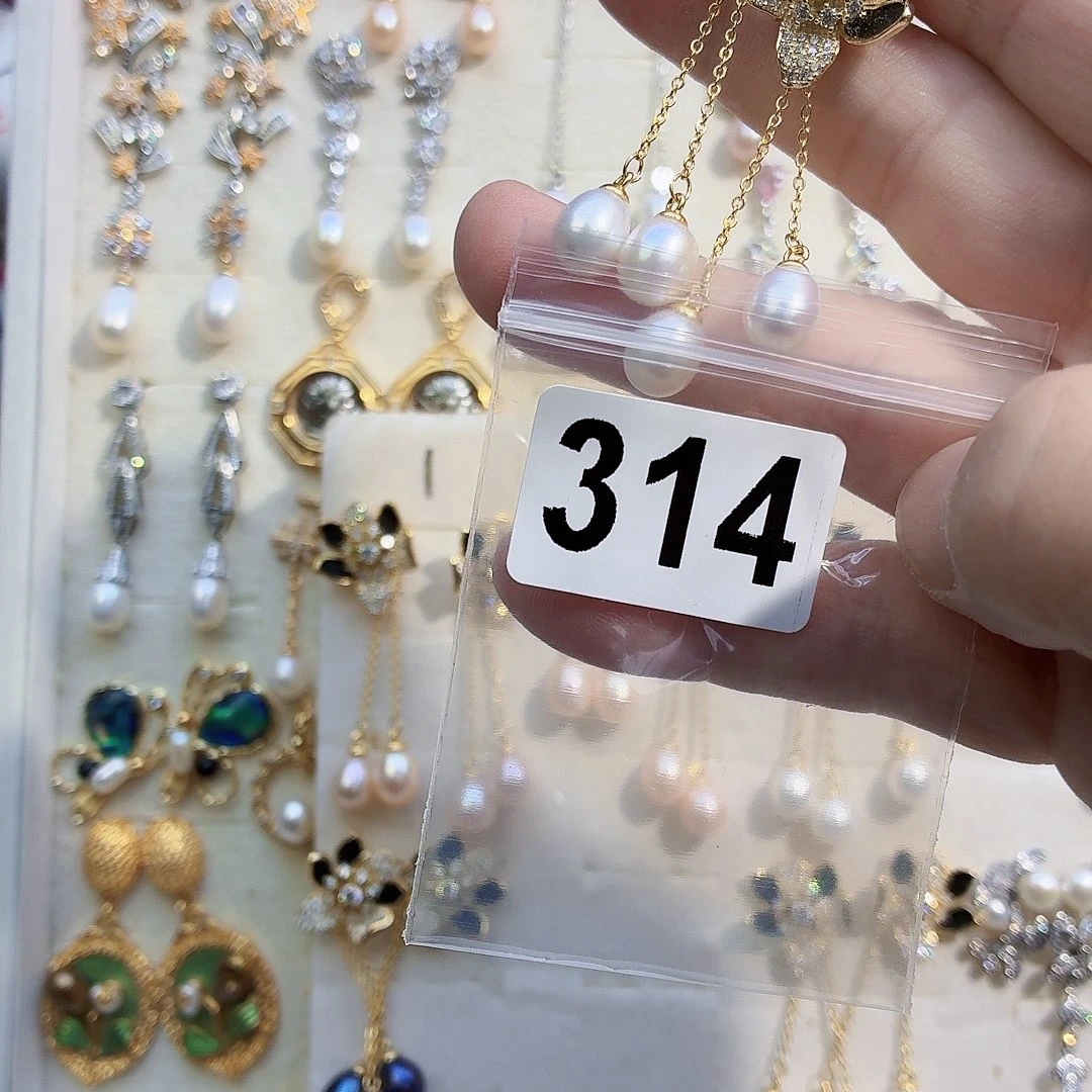 吾***）耳饰淡水珍珠合金