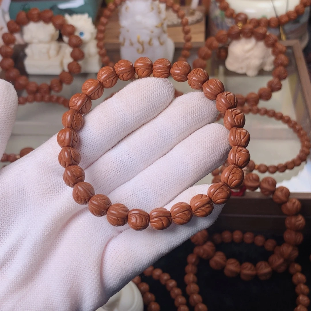 张***溪桃核吊坠玉龙脊手串09