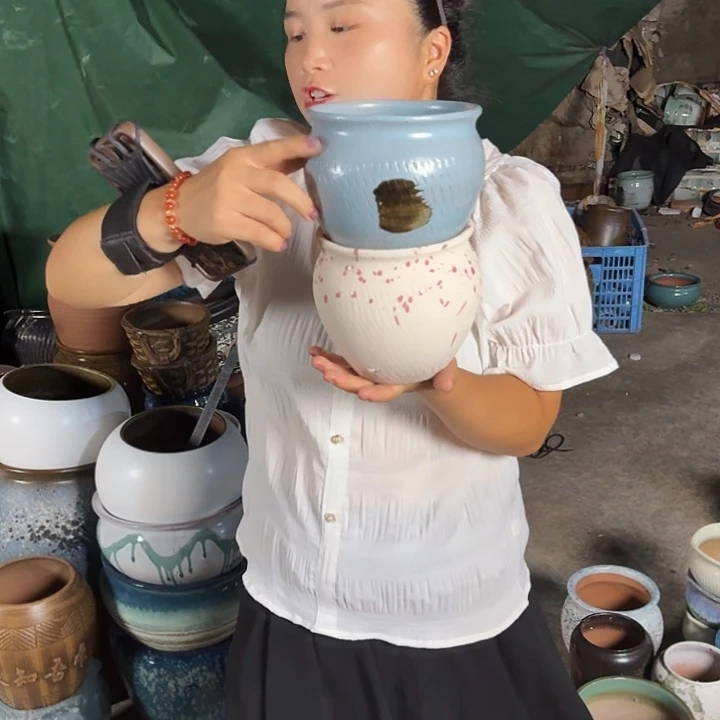 14口14高瑕疵两个盆子。