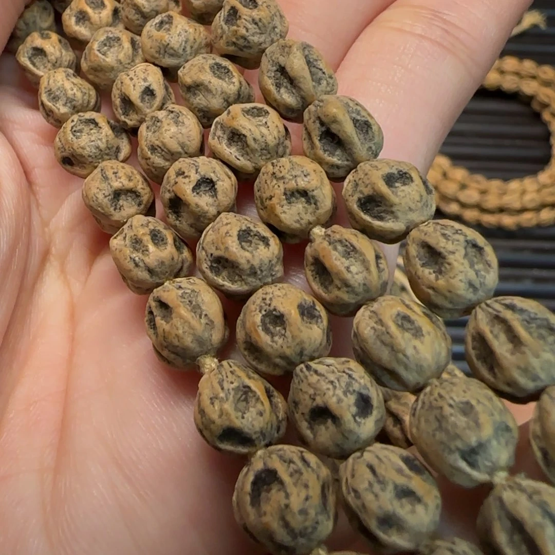 曾***约柏香籽/百香籽吊坠