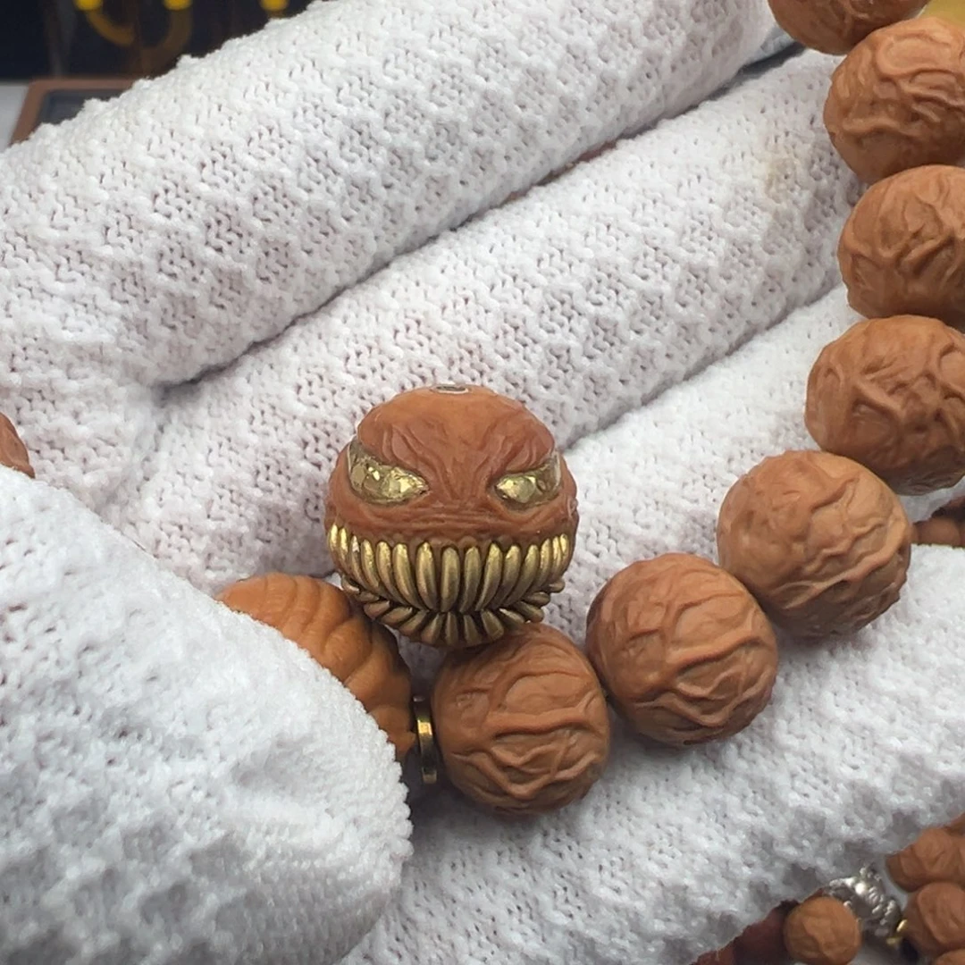 新***才吊坠猴头核桃毒液