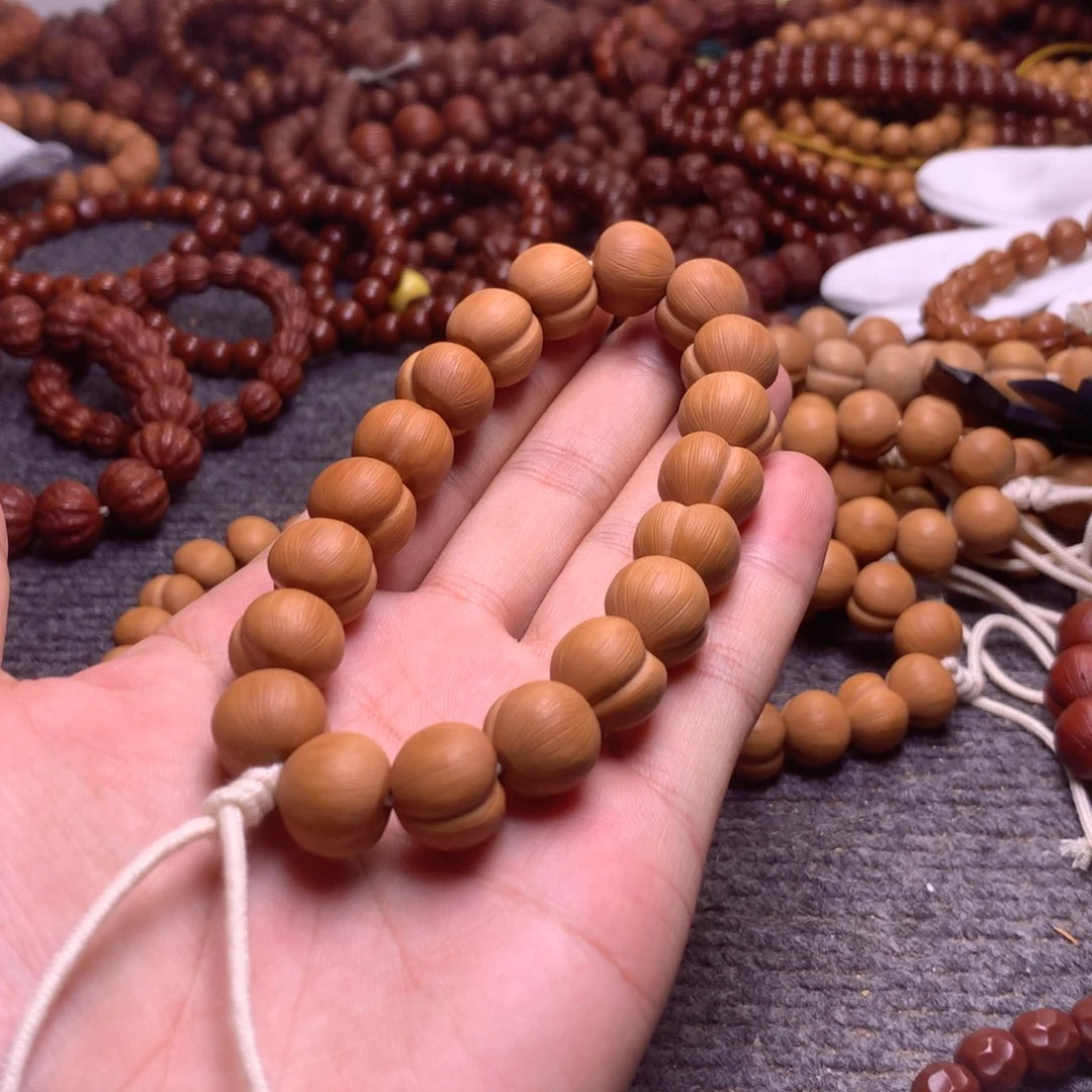 猴头核桃手串14左右爱心屁桃。 返油款