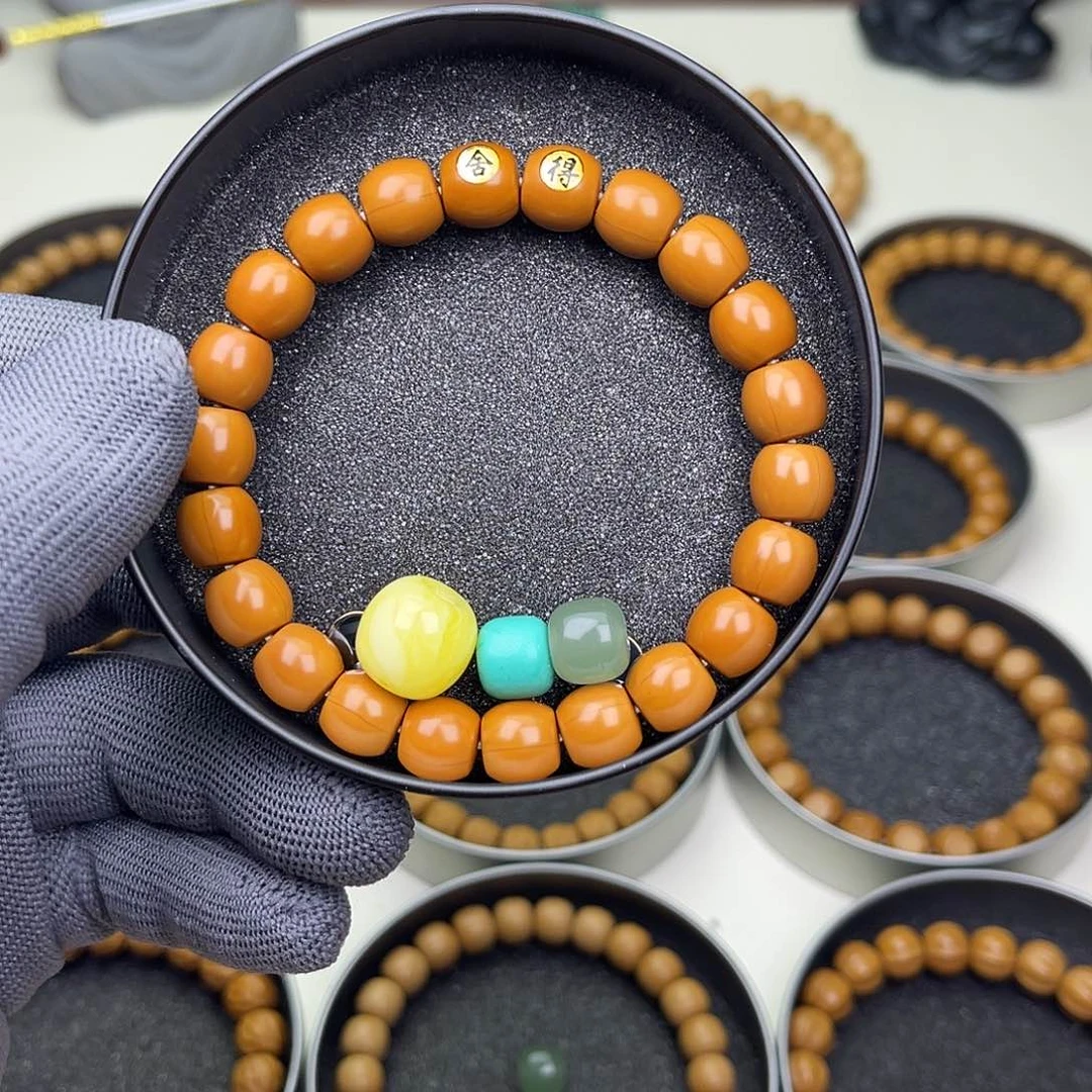 猴头核桃吊坠苹*橙猴头核桃手串舍得