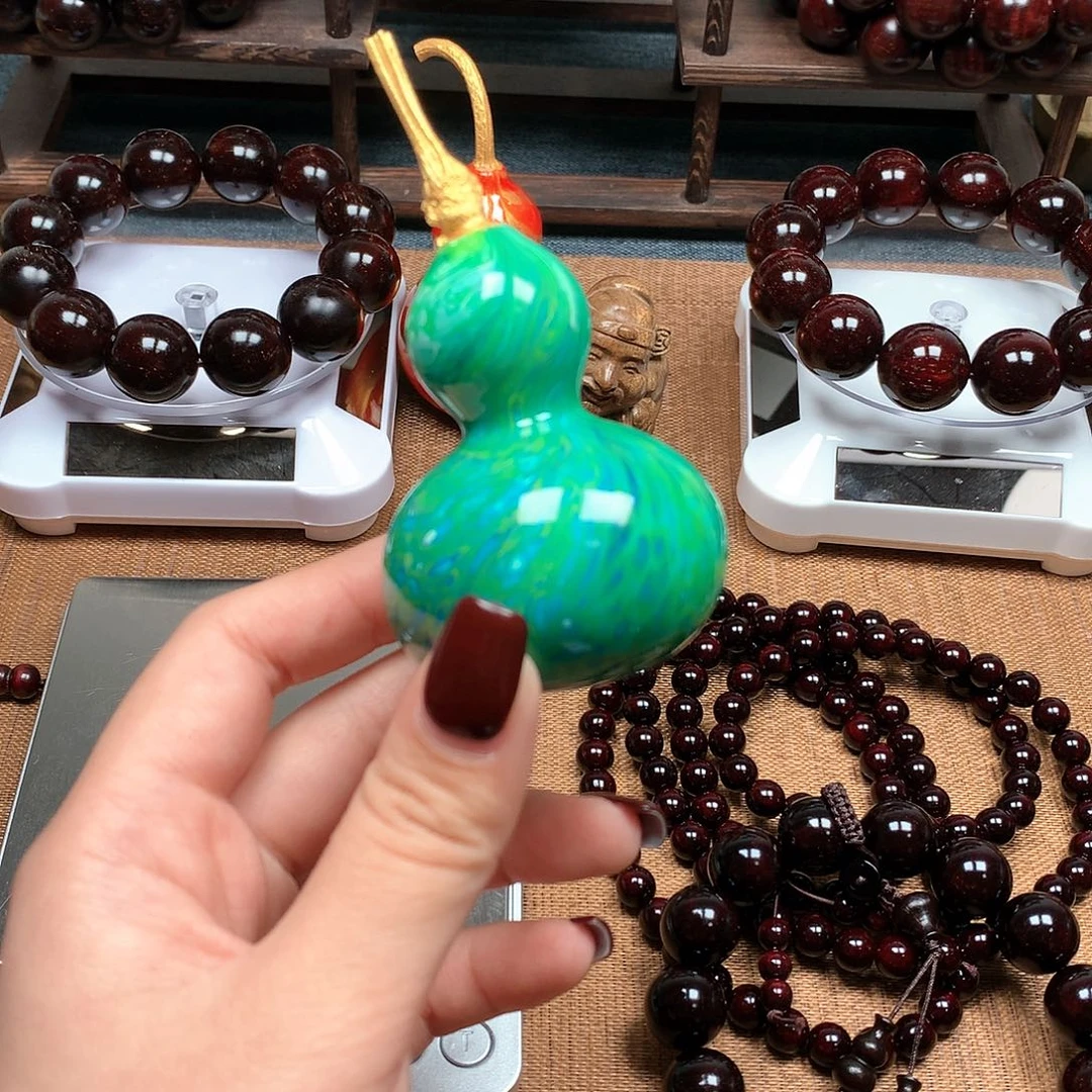 东非黑黄檀（紫光檀）振****宇大漆葫芦。