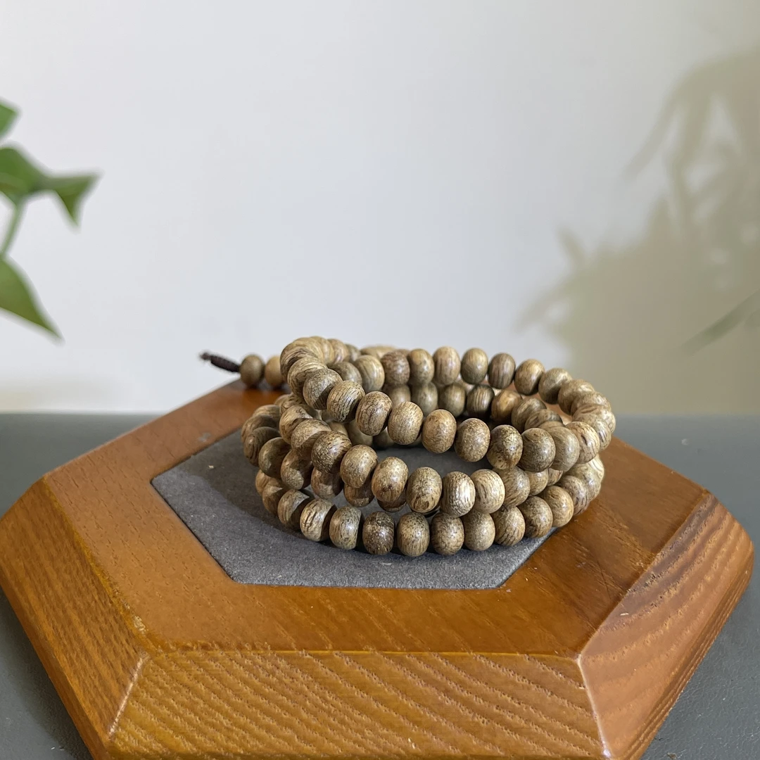 ZYCX-029 印尼雨淋土沉算盘0.6 约：108颗*6mm 8.36g