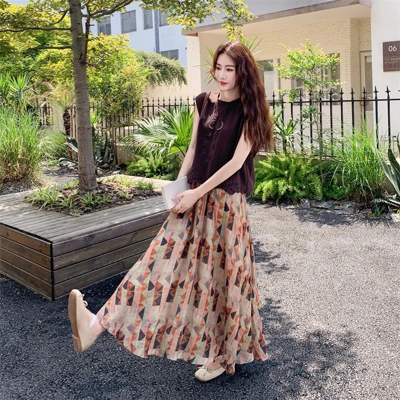 港风复古套装女夏季2025新款镂空设计感背心印花褶皱半身裙两件套