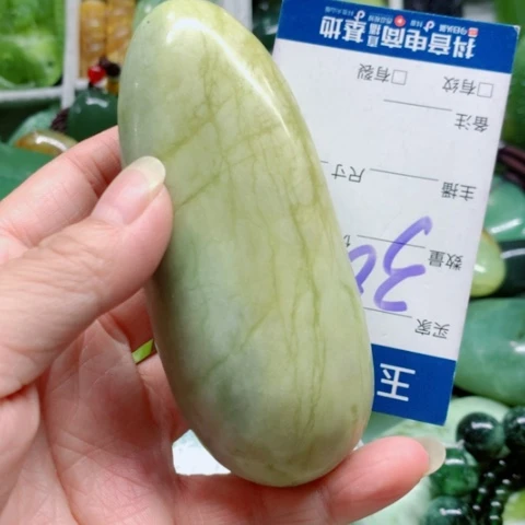 未镶嵌蛇纹石玉手把件