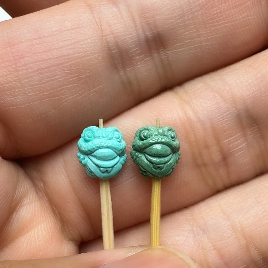 绿松石未镶嵌醒狮一对