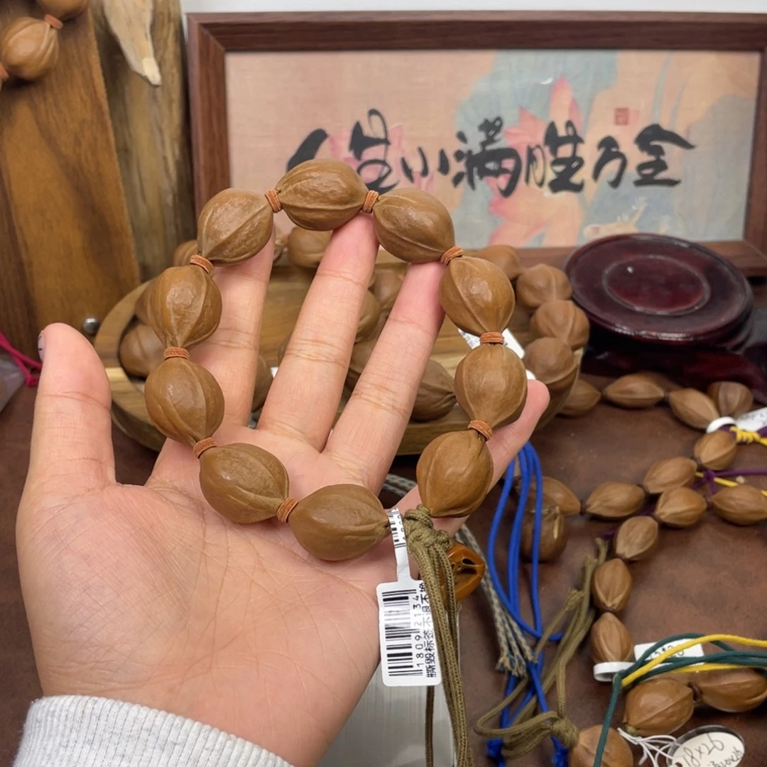 曾***在橄榄核手串/手链20.5*27梅林铁核