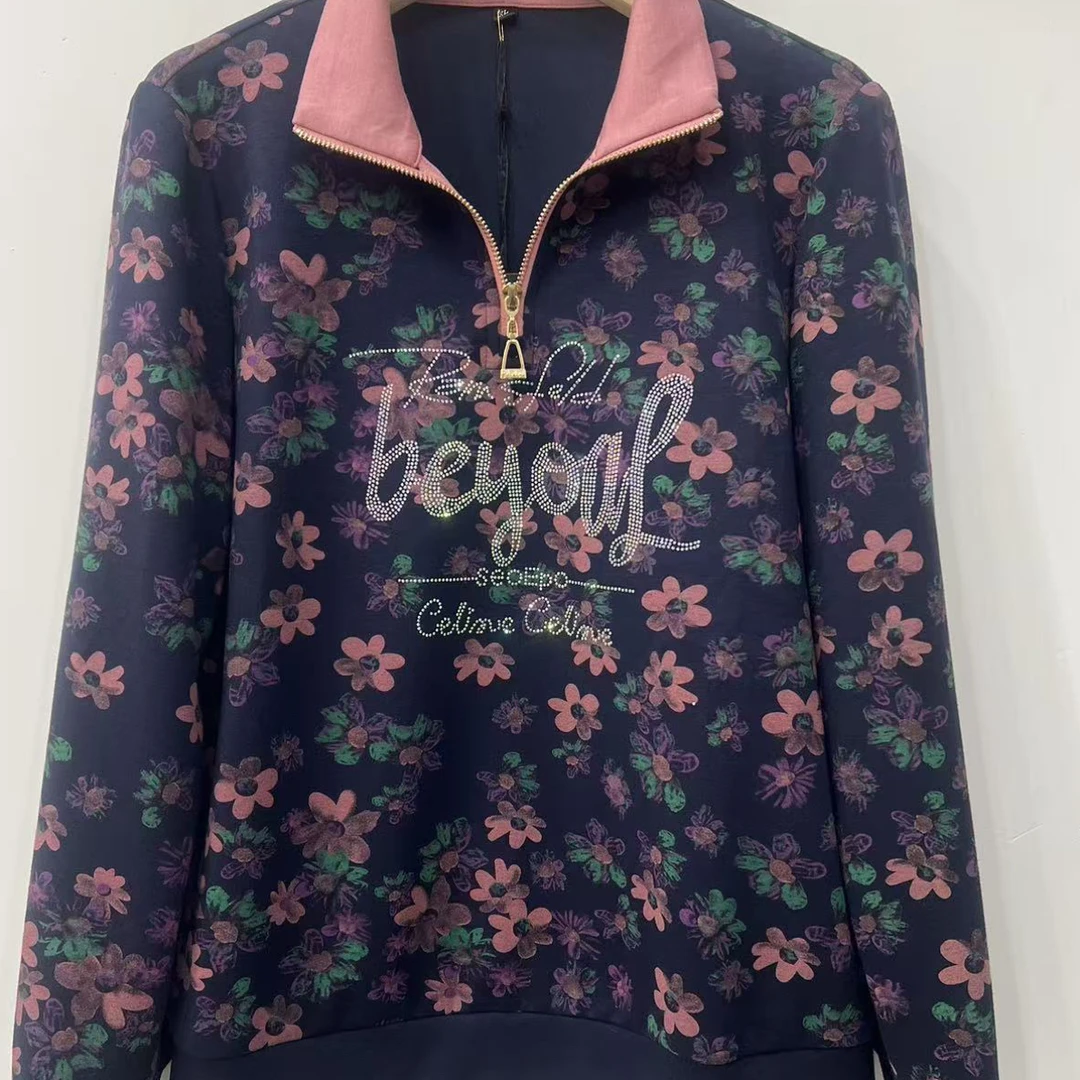 秋季宽松连帽蓝色印花卫衣时尚百搭适合女性穿着