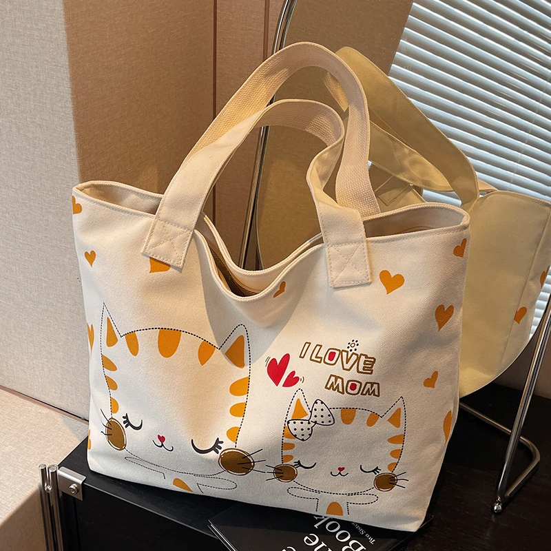 帆布包包女大容量2025新款春夏百搭单肩包休闲卡通学生上课托特包