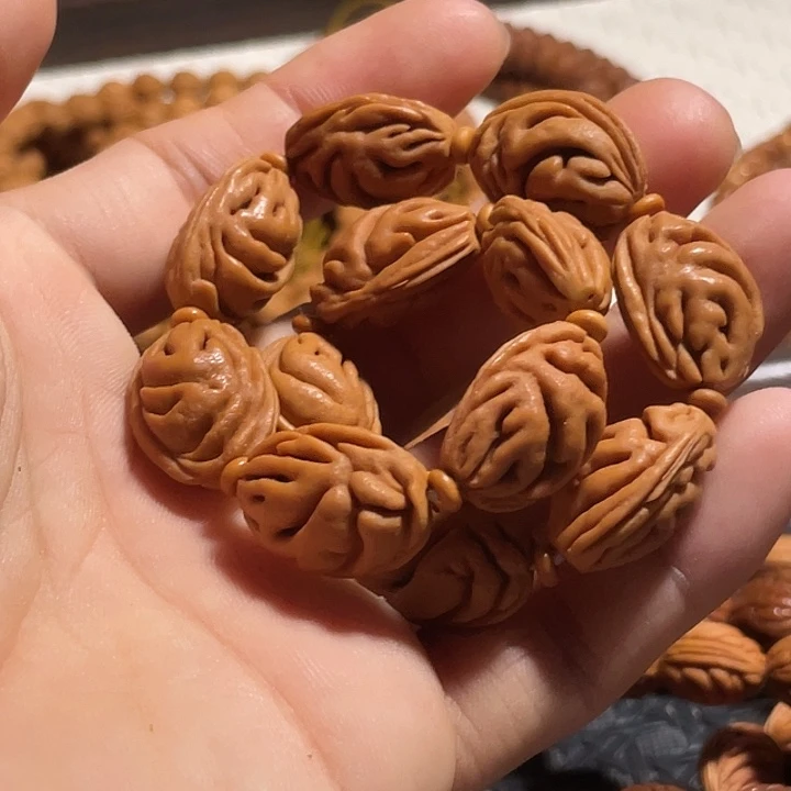 朱***明碧桃核粗肌三通手持