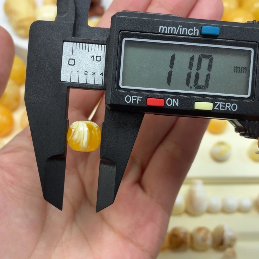 琥珀未镶嵌珠宝奇石焦皮金橘白溶洞拉丝老型11mm