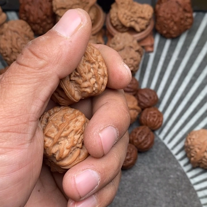 文玩核桃把件笨*牛白狮子