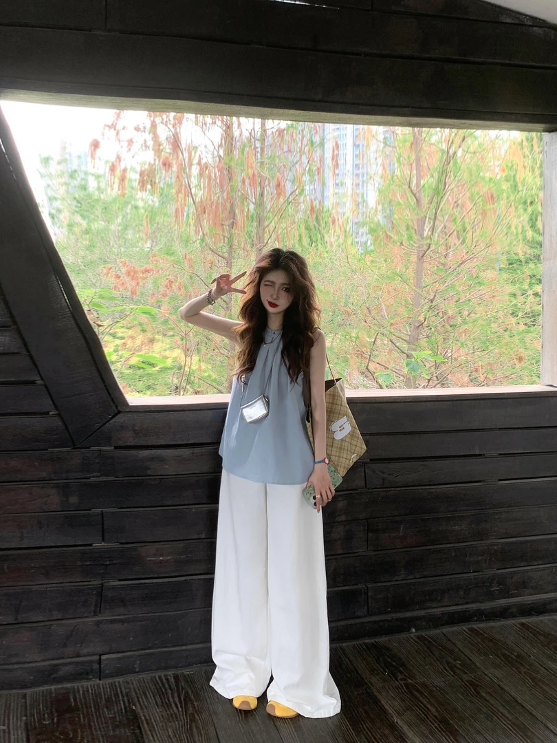 夏日出游多巴胺穿搭蓝色温柔感无袖上衣休闲百搭宽松背心女2025潮