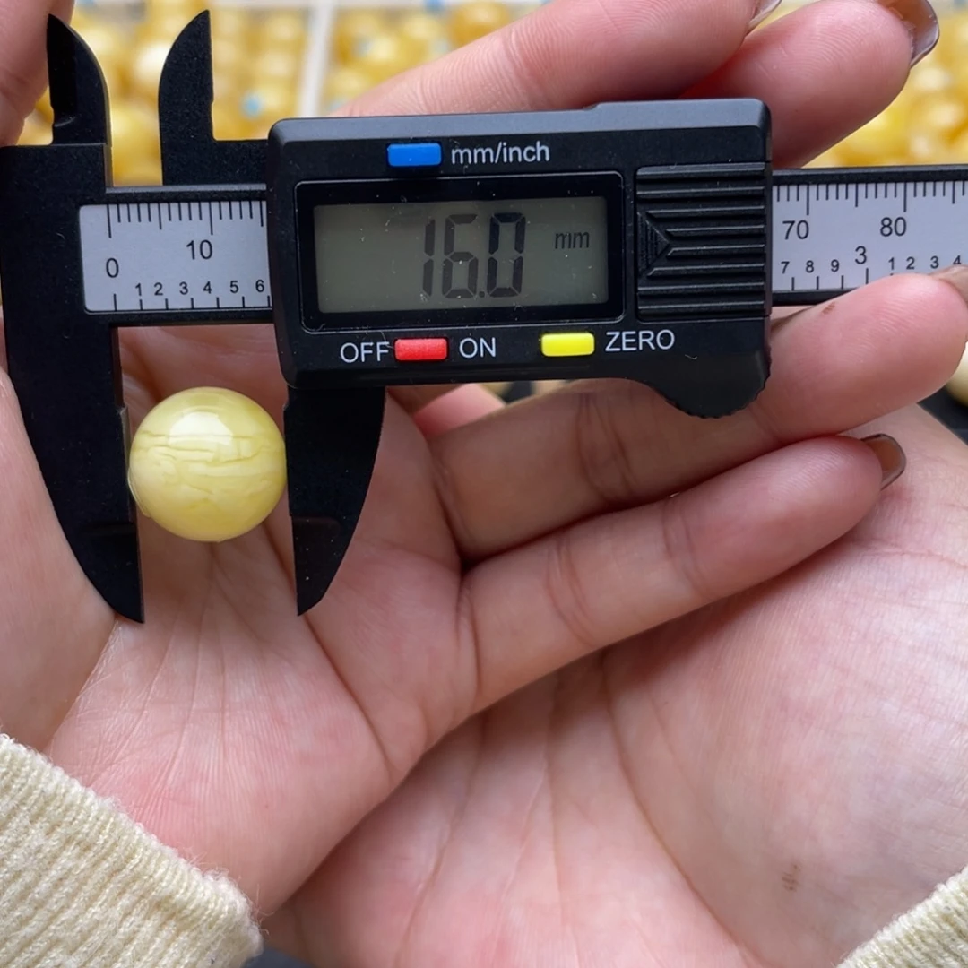 琥珀未镶嵌裸石蜜蜡圆珠微瑕笑