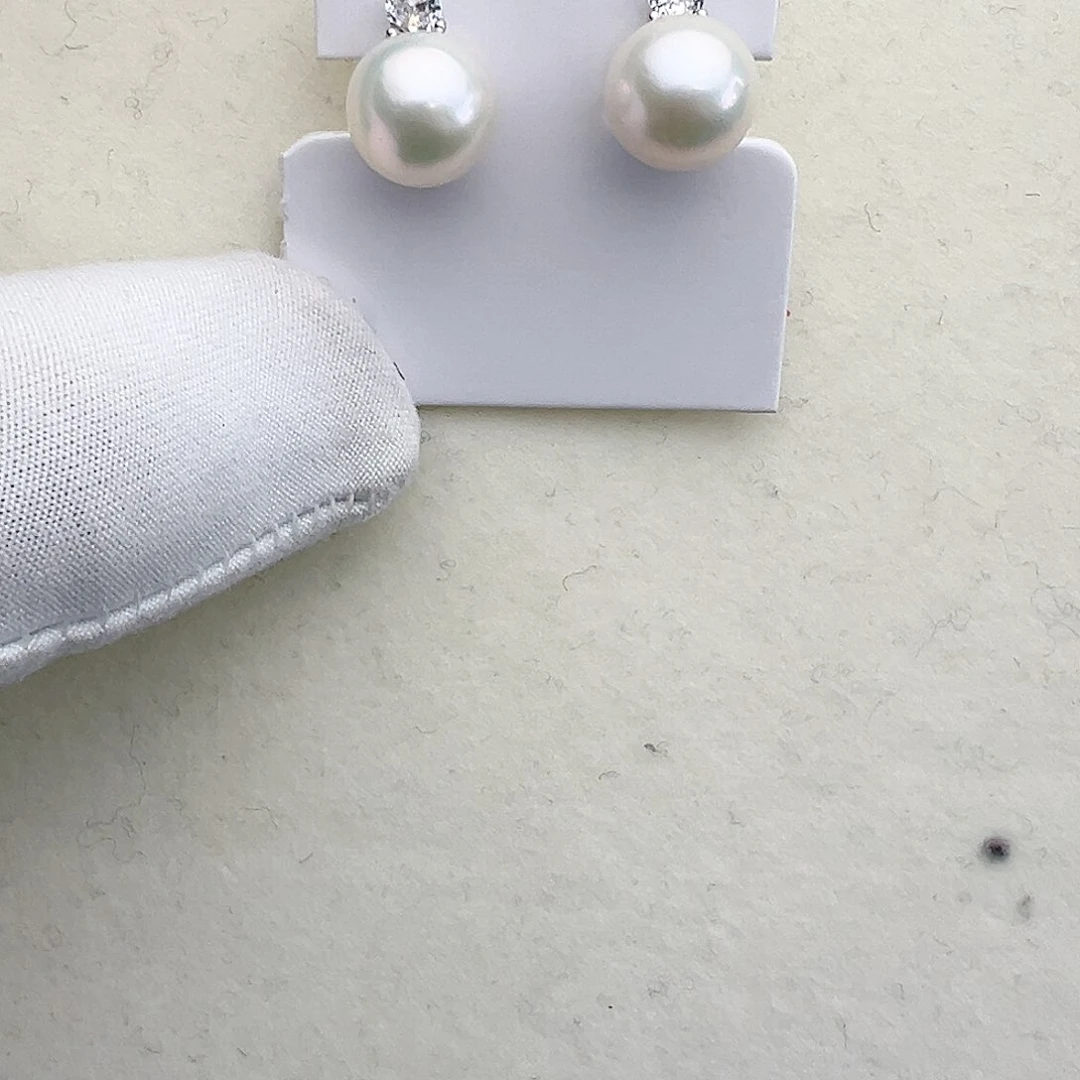 淡水珍珠耳饰银S925镶嵌幸*草戴妃款