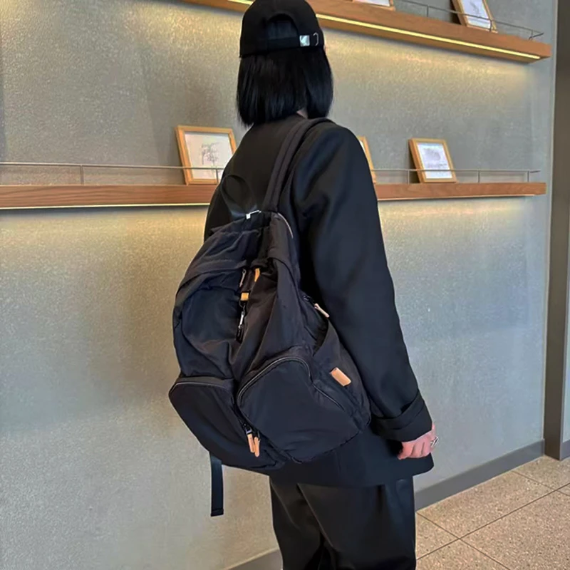 轻便休闲双肩包女时尚大容量旅游背包2025新款百搭柔软布包书包潮