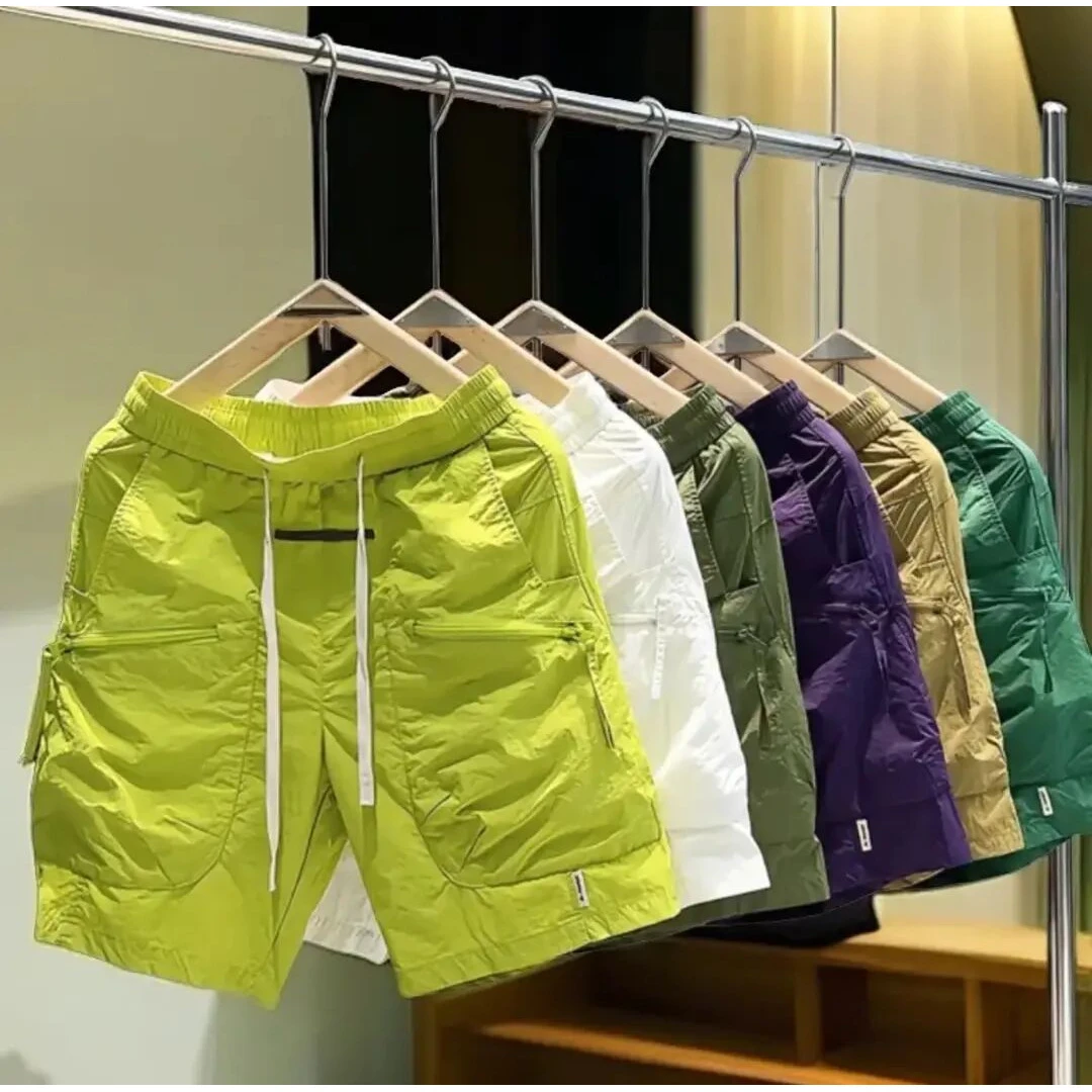 新款夏季工装风格男士速干休闲裤时尚透男士夏季速干三分沙滩裤