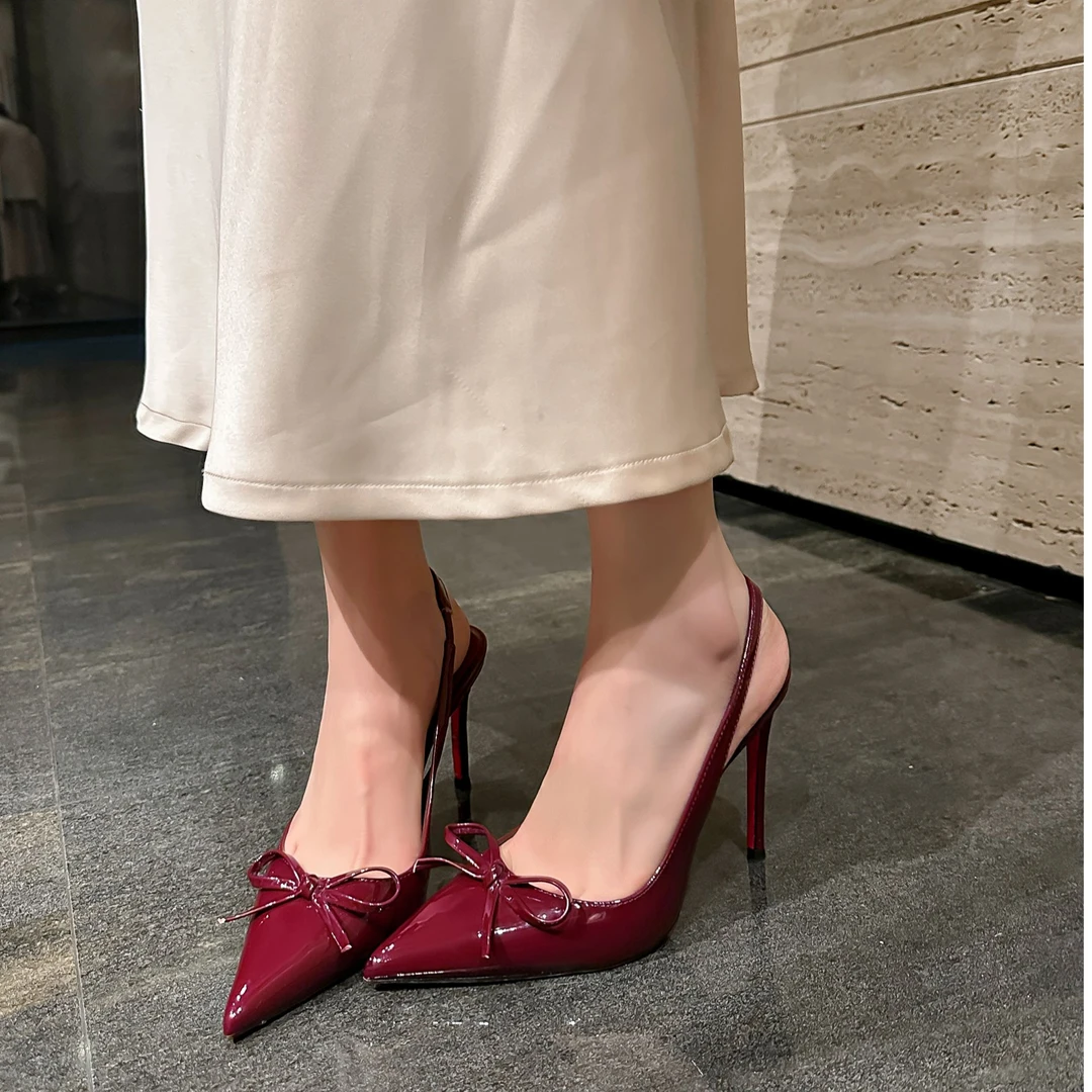 2025春夏新款尖头气质包头高跟凉鞋浅口蝴蝶结性感细跟后空高跟鞋
