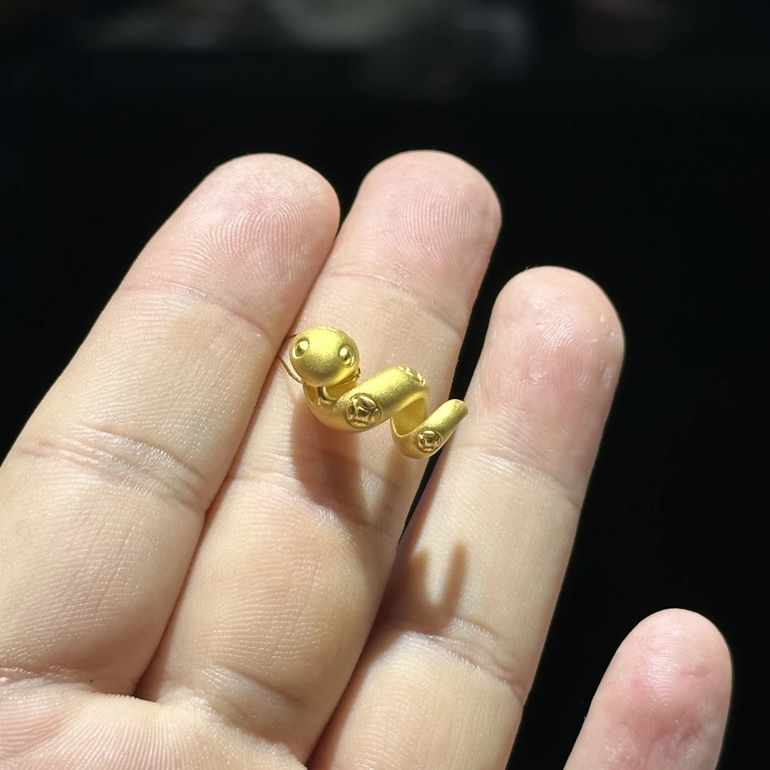 足金999 铜钱卷卷蛇通孔 1.483