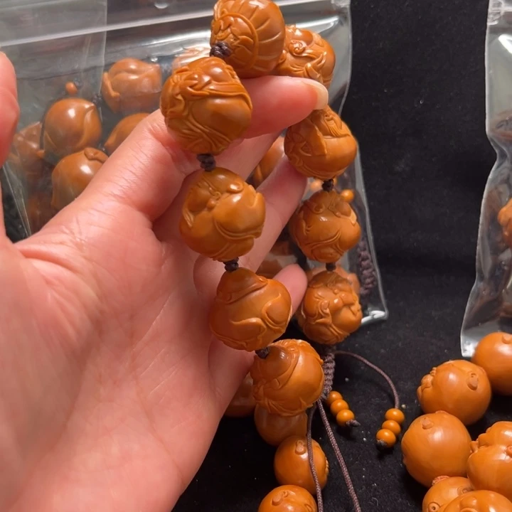 丁***店橄榄核手串财神21