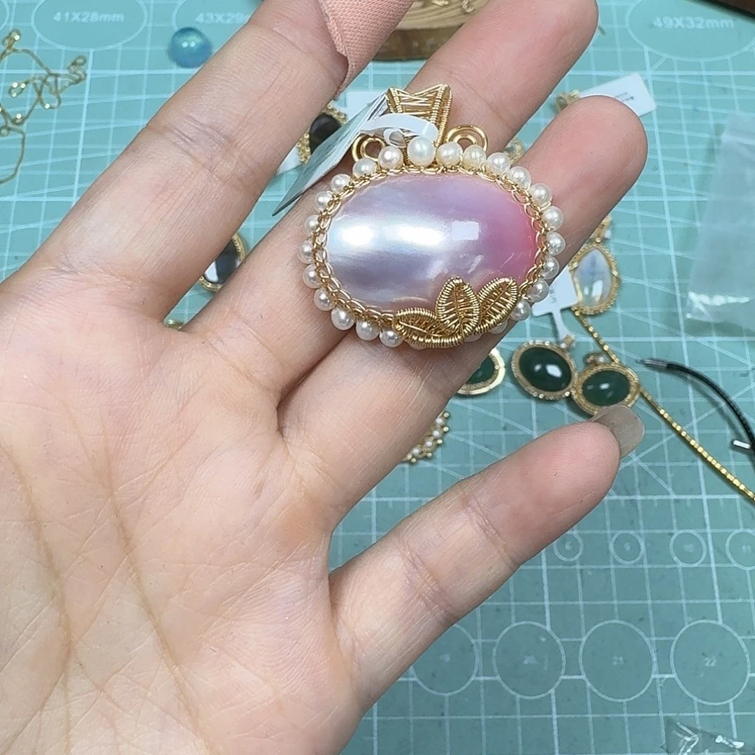 钛钢合金特马贝吊坠