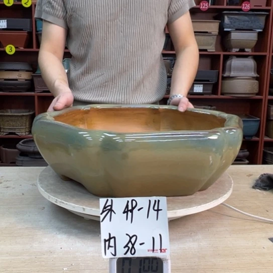 楚***禺紫砂花盆中香气浓