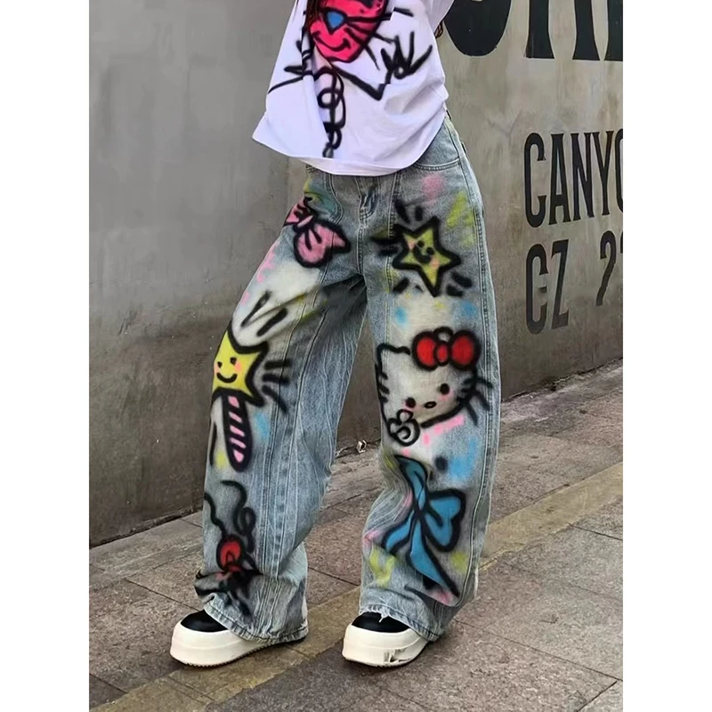 多巴胺卡通手绘涂鸦牛仔裤女秋季新款复古重工设计感拖地弯刀裤子