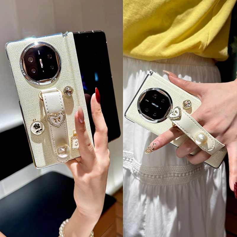 适用华为matex5手机壳新款折叠屏mateX6典藏版x3电镀时尚腕带女款